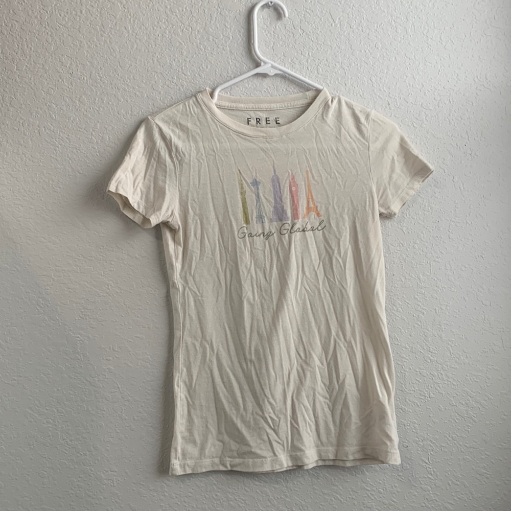 White T-shirt with building designs on the front